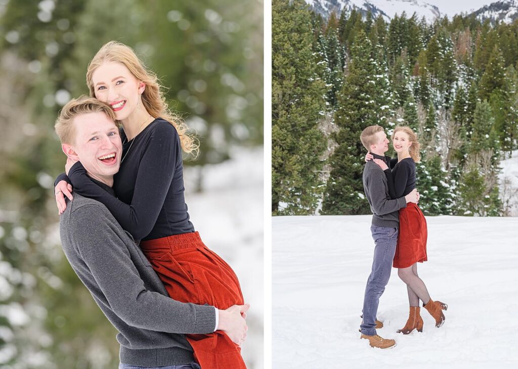 a closeup of a couple smiling in the snow surrounded by pine trees for their winter engagement photos