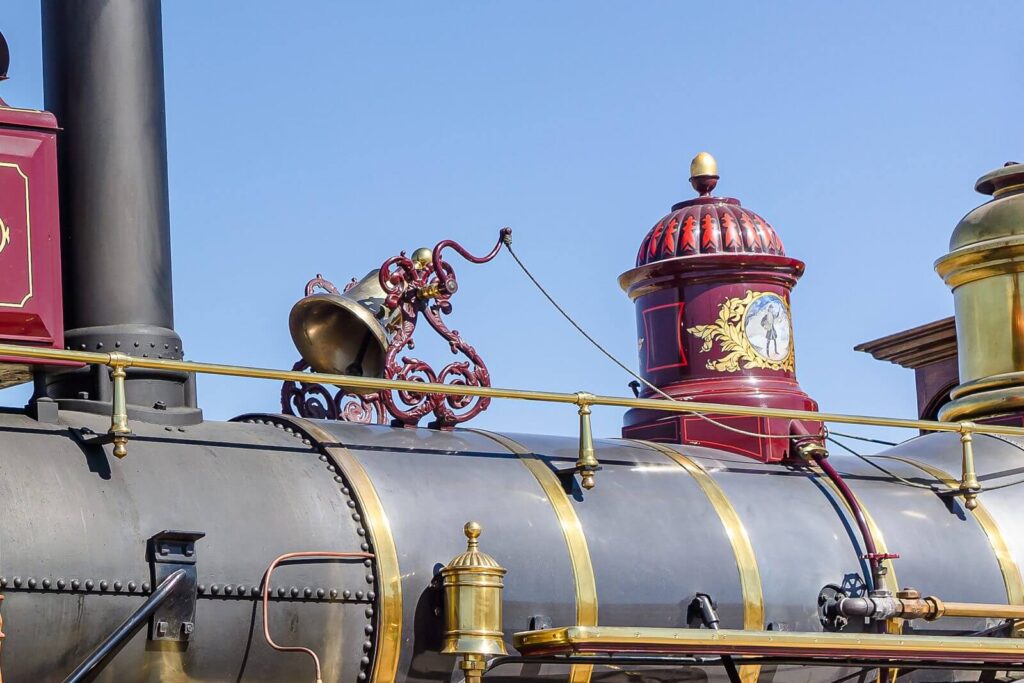 a closeup of the bell and dome of a beautiful 1800's steam engine at Golden Spike National Park